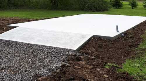 Dalles de béton sur sol